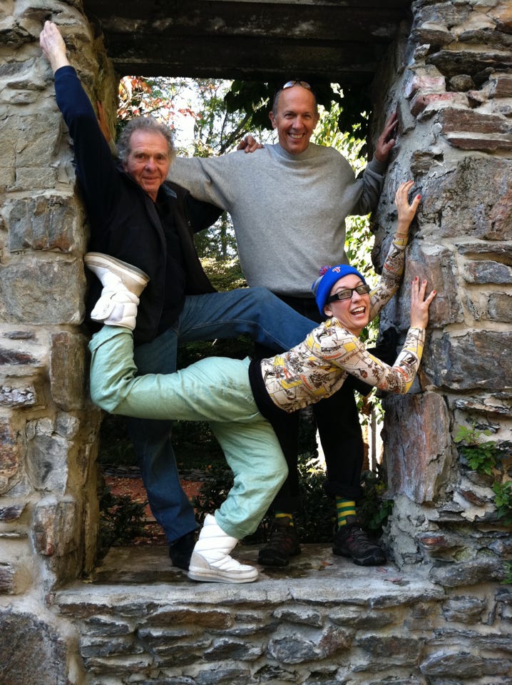 3 people posing in a stone doorway