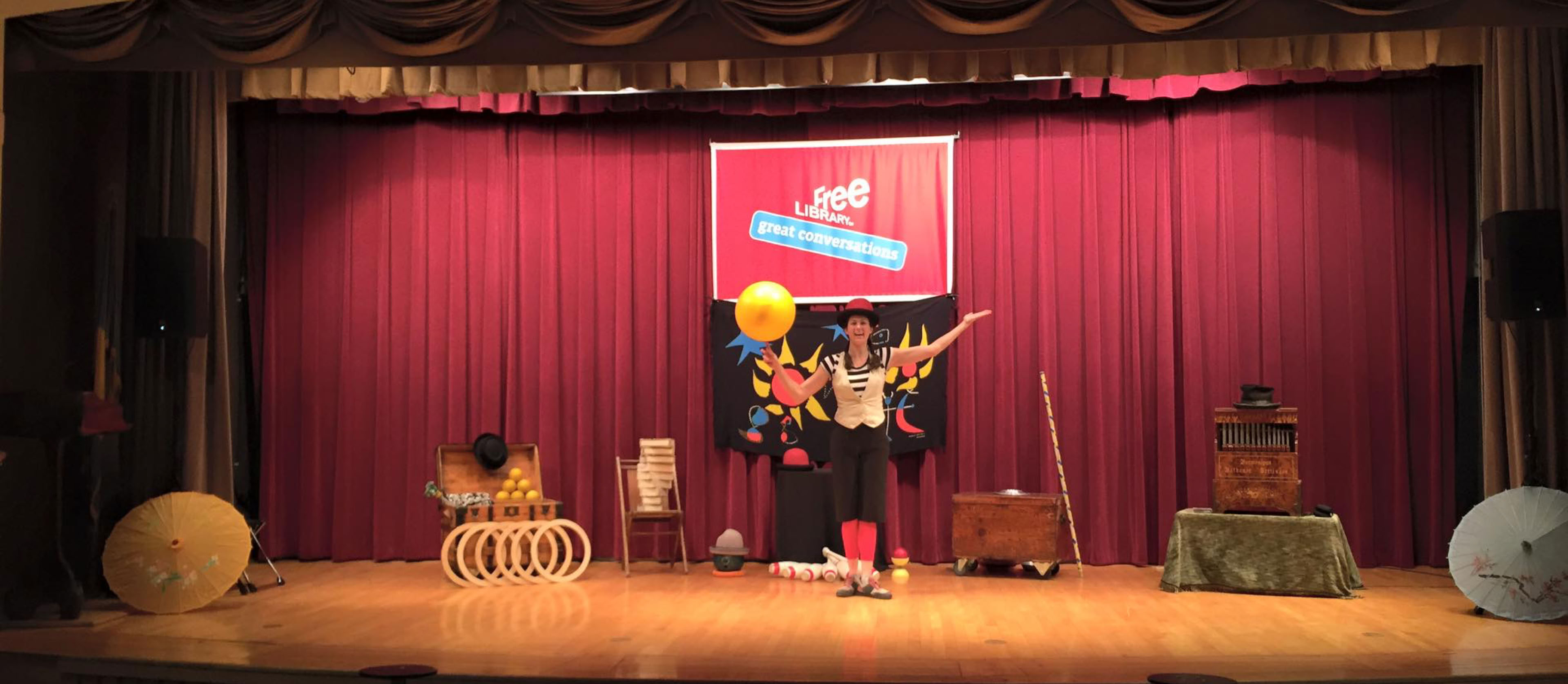 stage props and juggling equipment set up on a stage