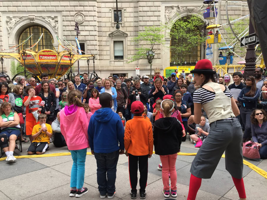 line of children standing in a street show