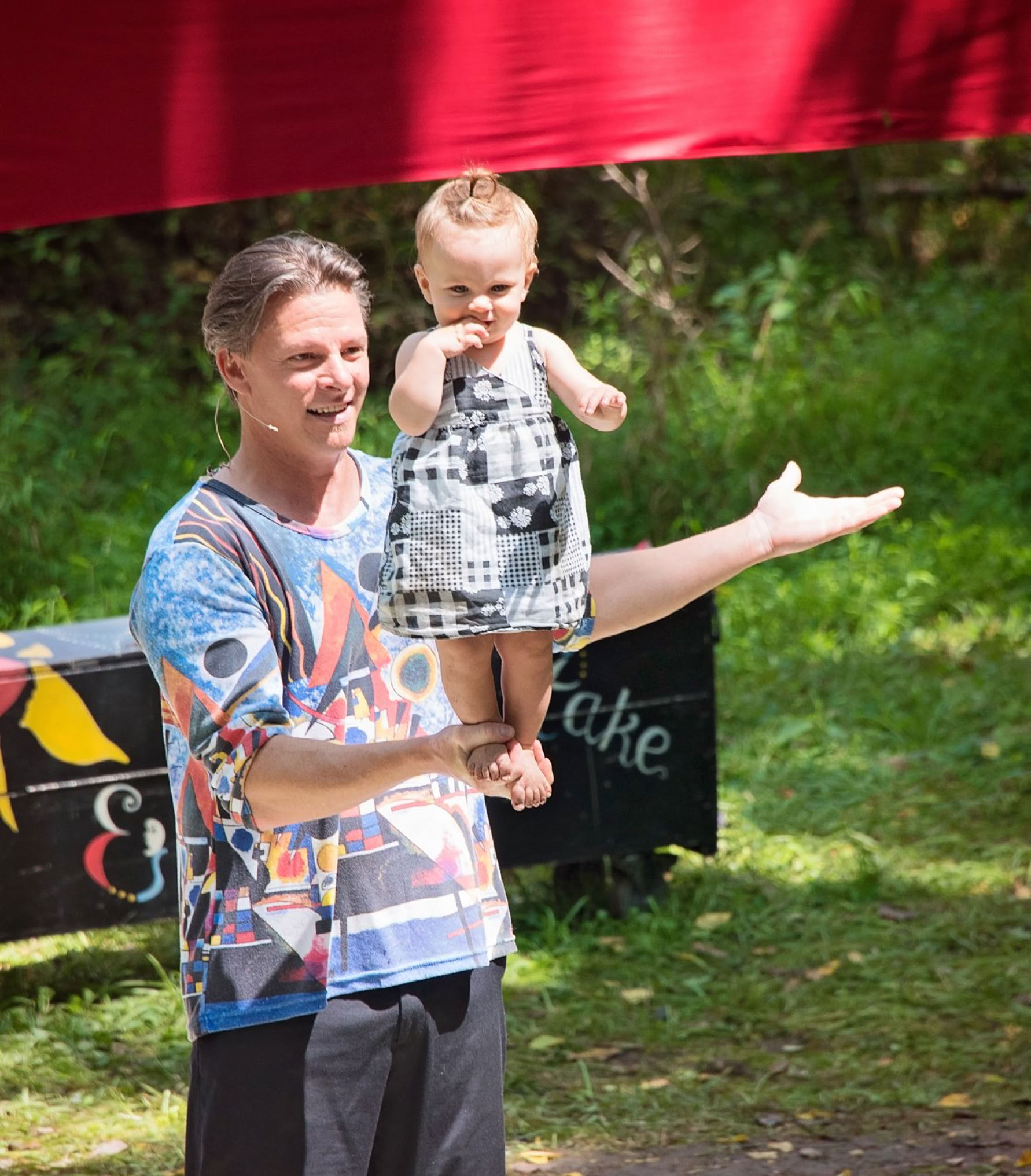Balancing 9 mo. old daughter at Philly Folk Festival